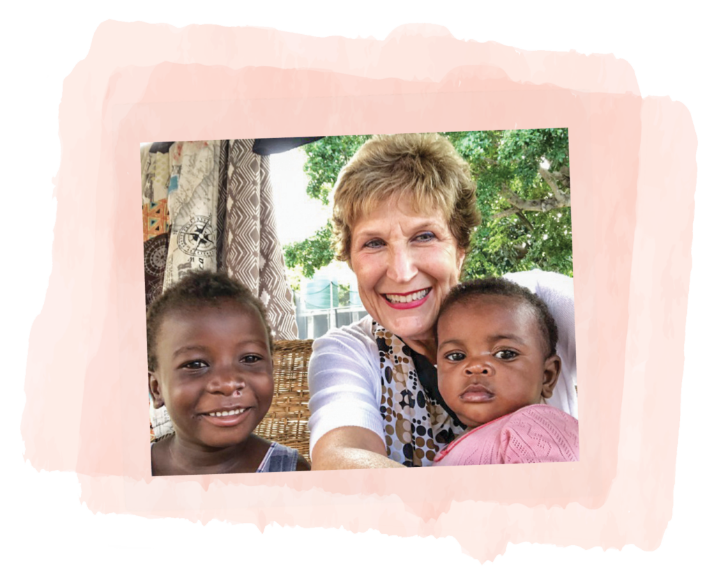 Debbie Miller with two children she met on a trip to Africa.