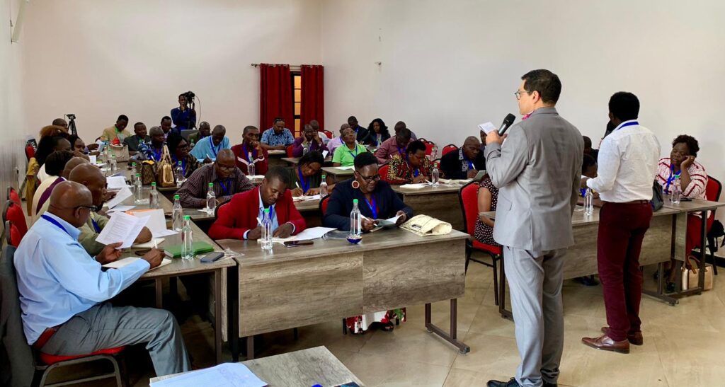 David Estrada speaking to attendees at Win the World Conference